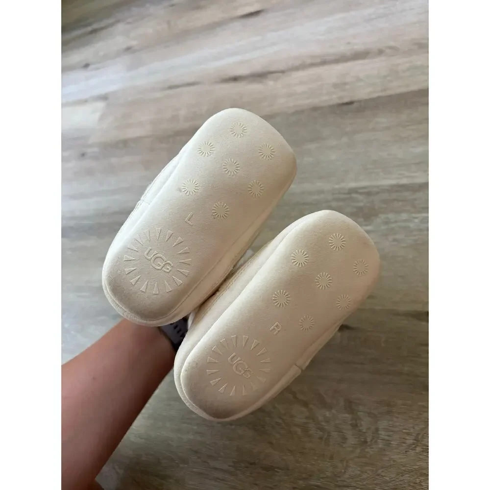 UGG Baby Skylar Booties in cream